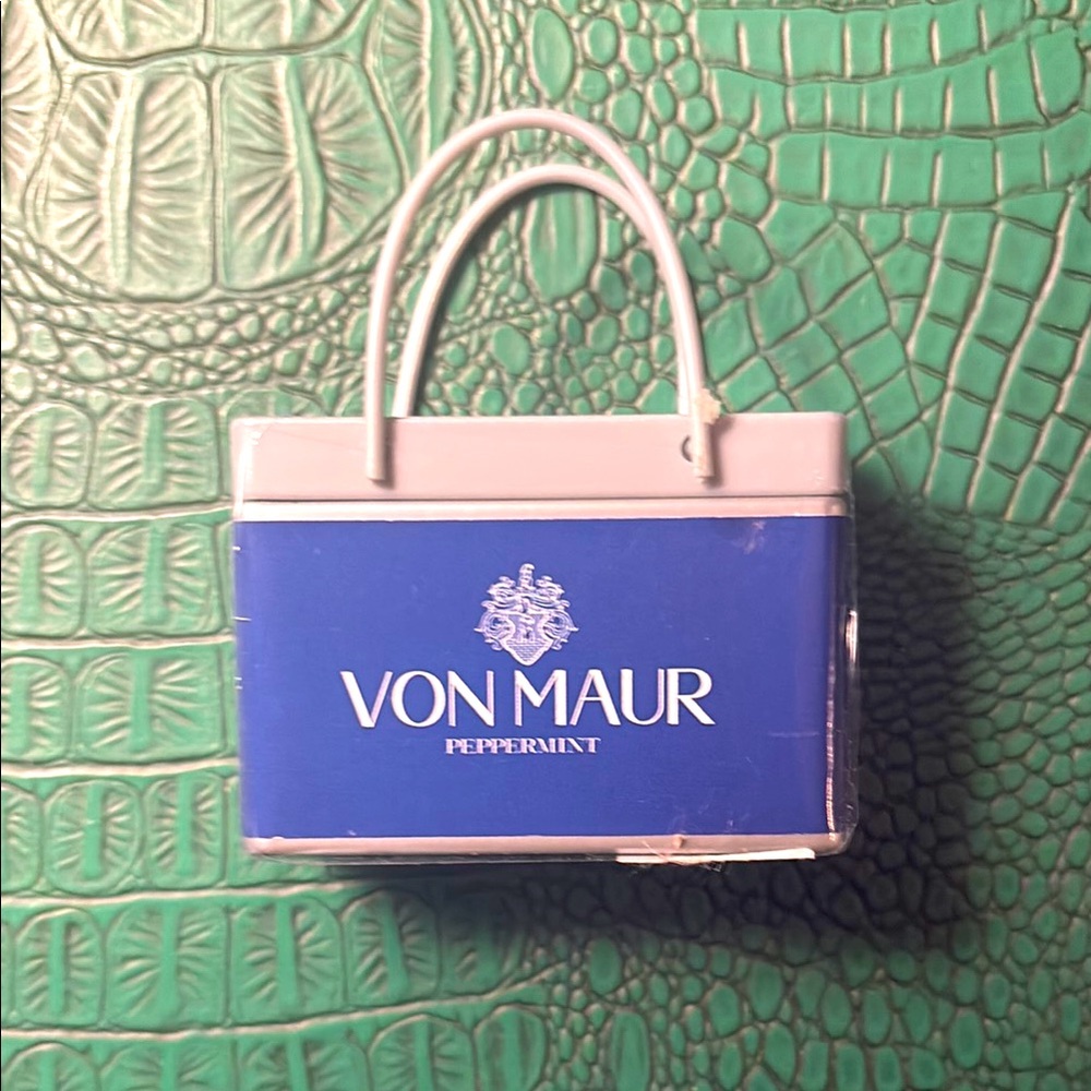 Blue and silver Von Maur mini bag